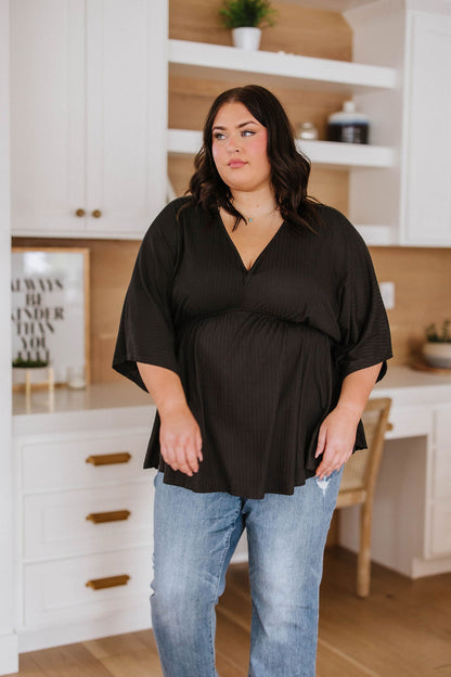 Storied Moments Draped Peplum Top in Black